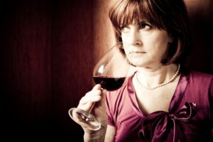 Women in her 50s drinking wine